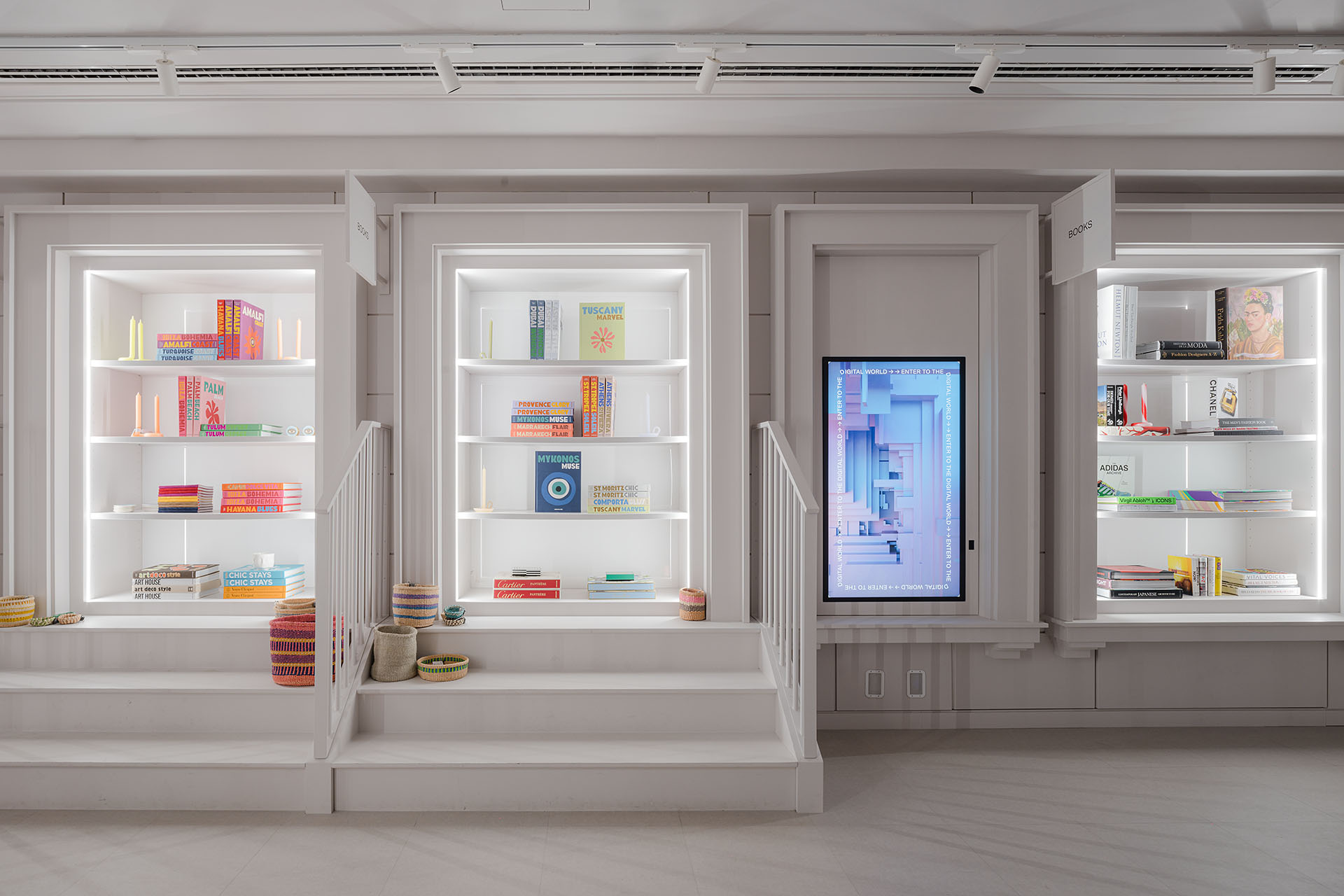 white walled retail space with shelves built to look like the windows of homes. 