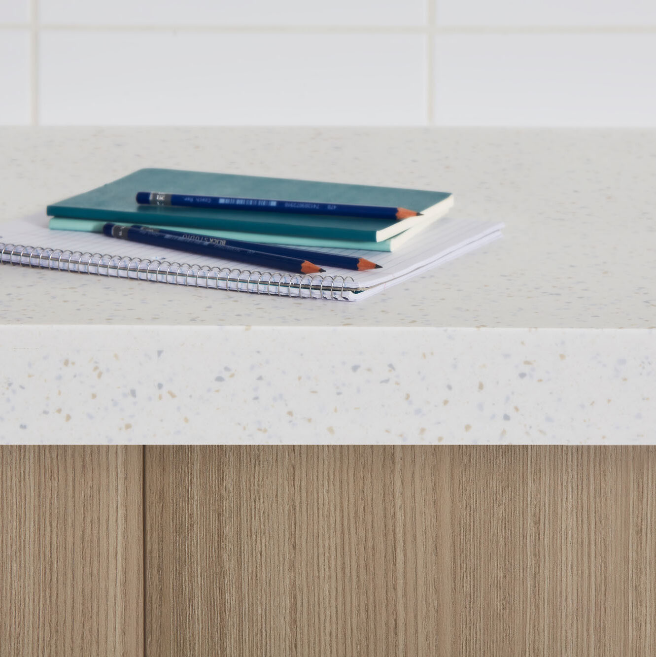 formica coutertop with notebooks 