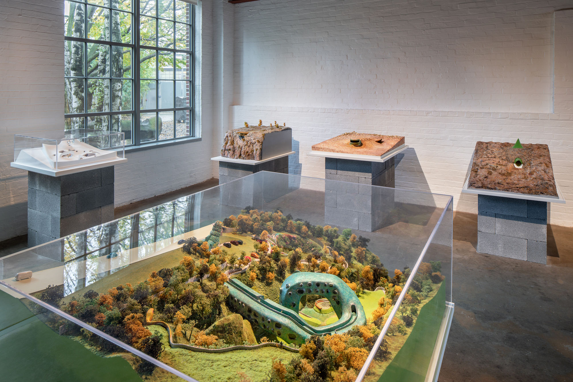 installation view of five architectural models at the noguchi museum