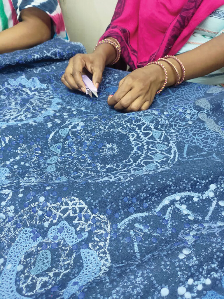 worker assembling fabric