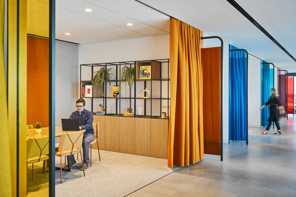 interior of colorful office with curtain dividers