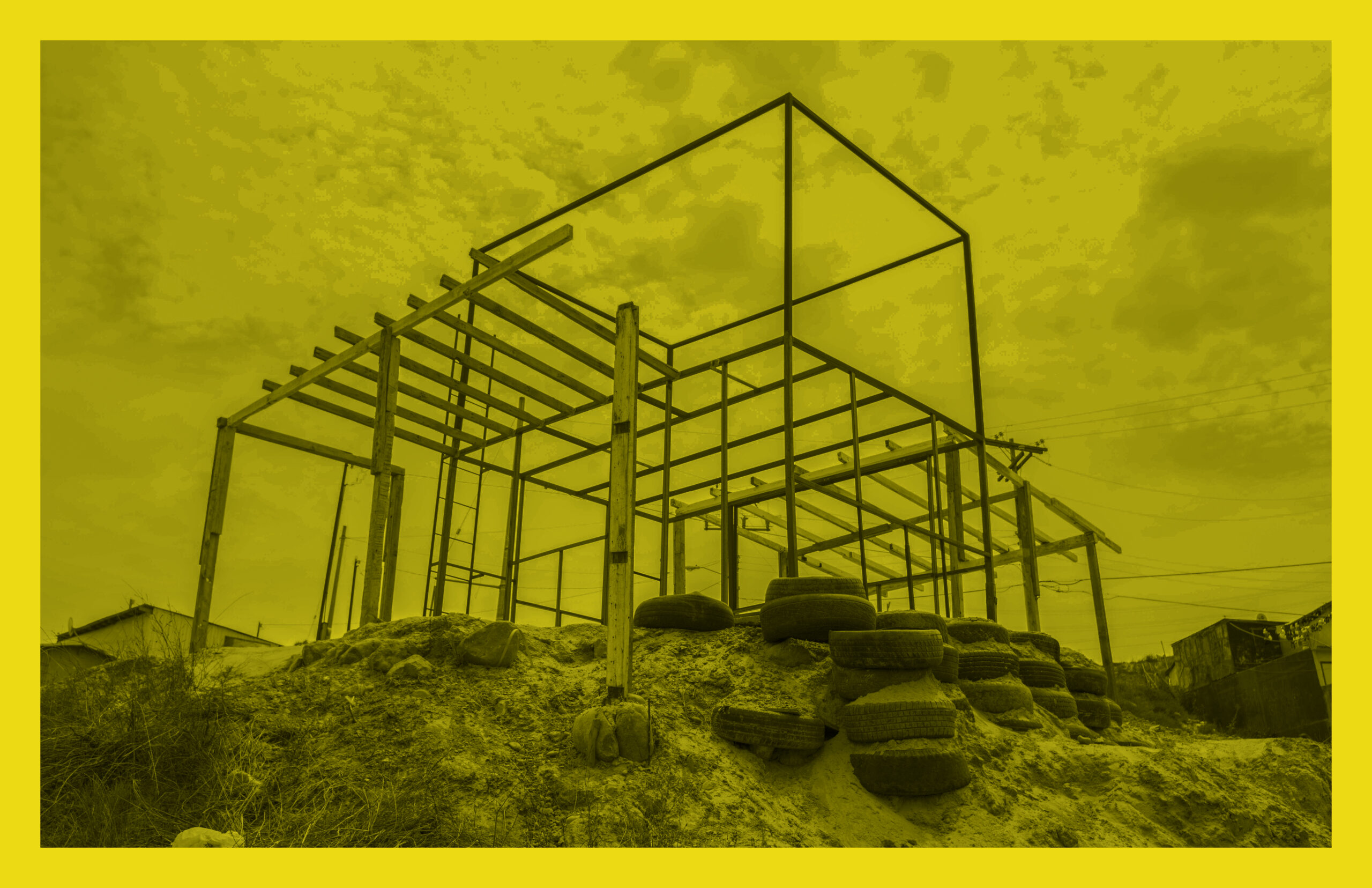 a yellow tinted image of scaffolding
