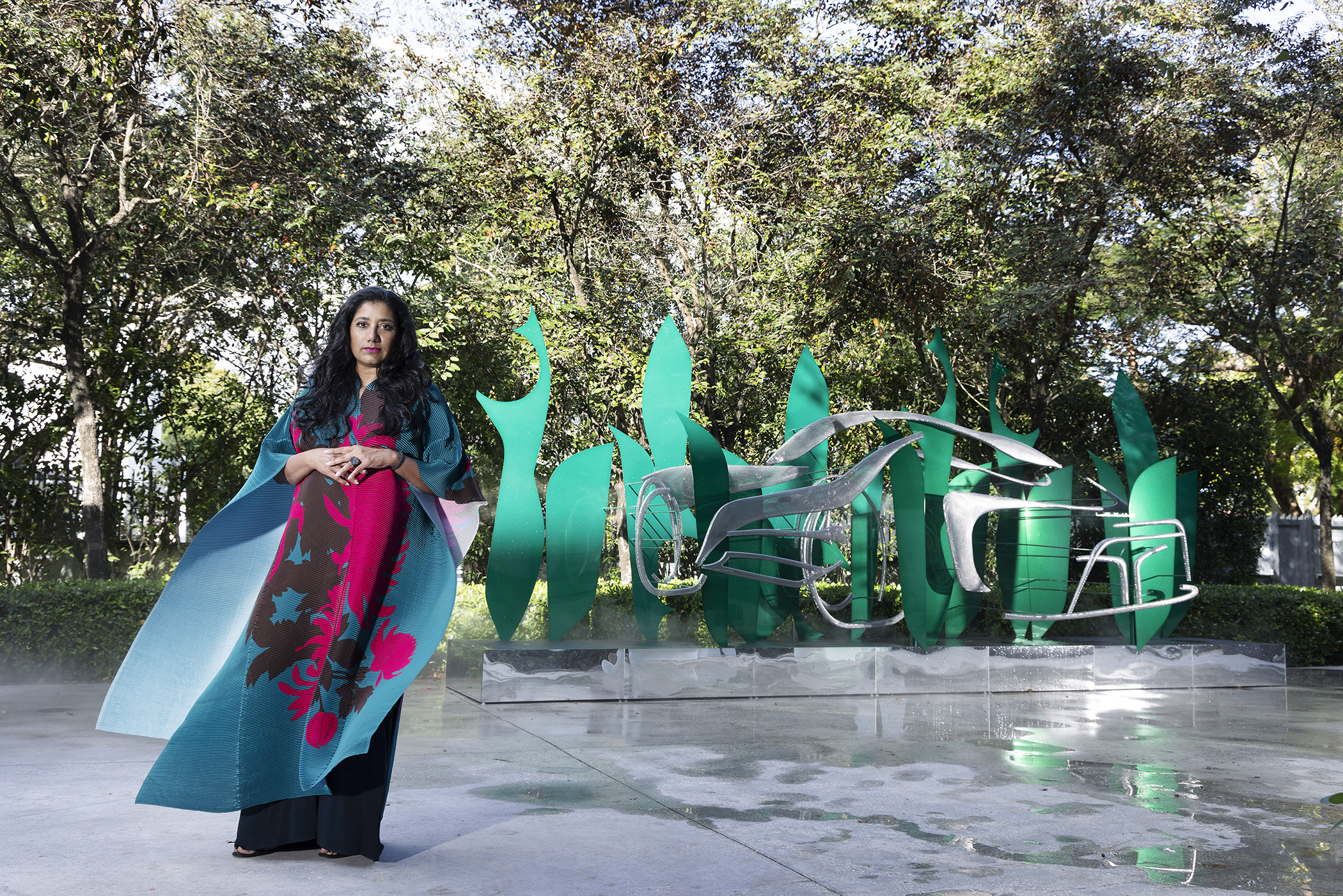 Suchi Reddy standing in front of her sculpture at the institute of contemporary art miami
