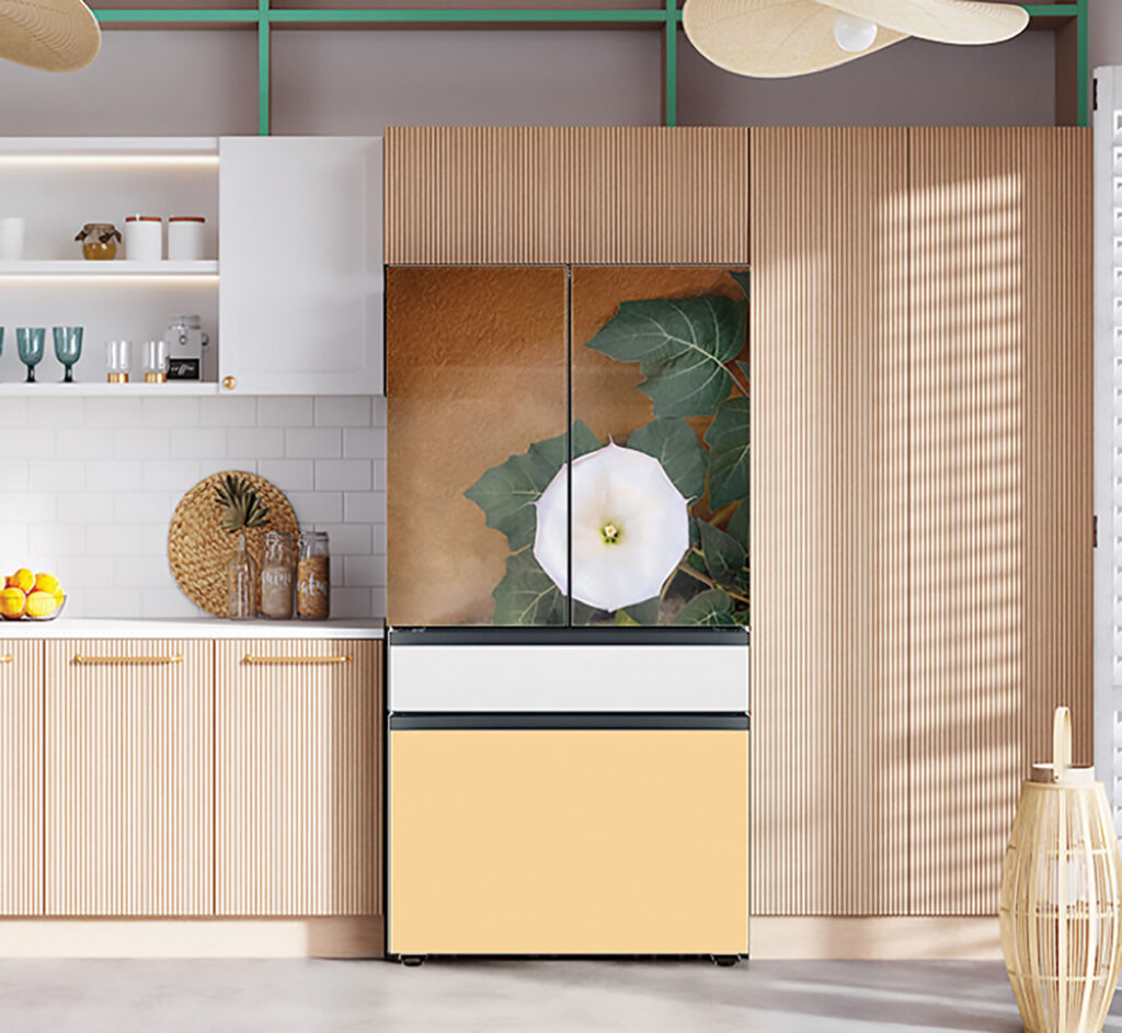 Image of a kitchen interior with wooden cabinets and and a printed pattern on the refrigerator 