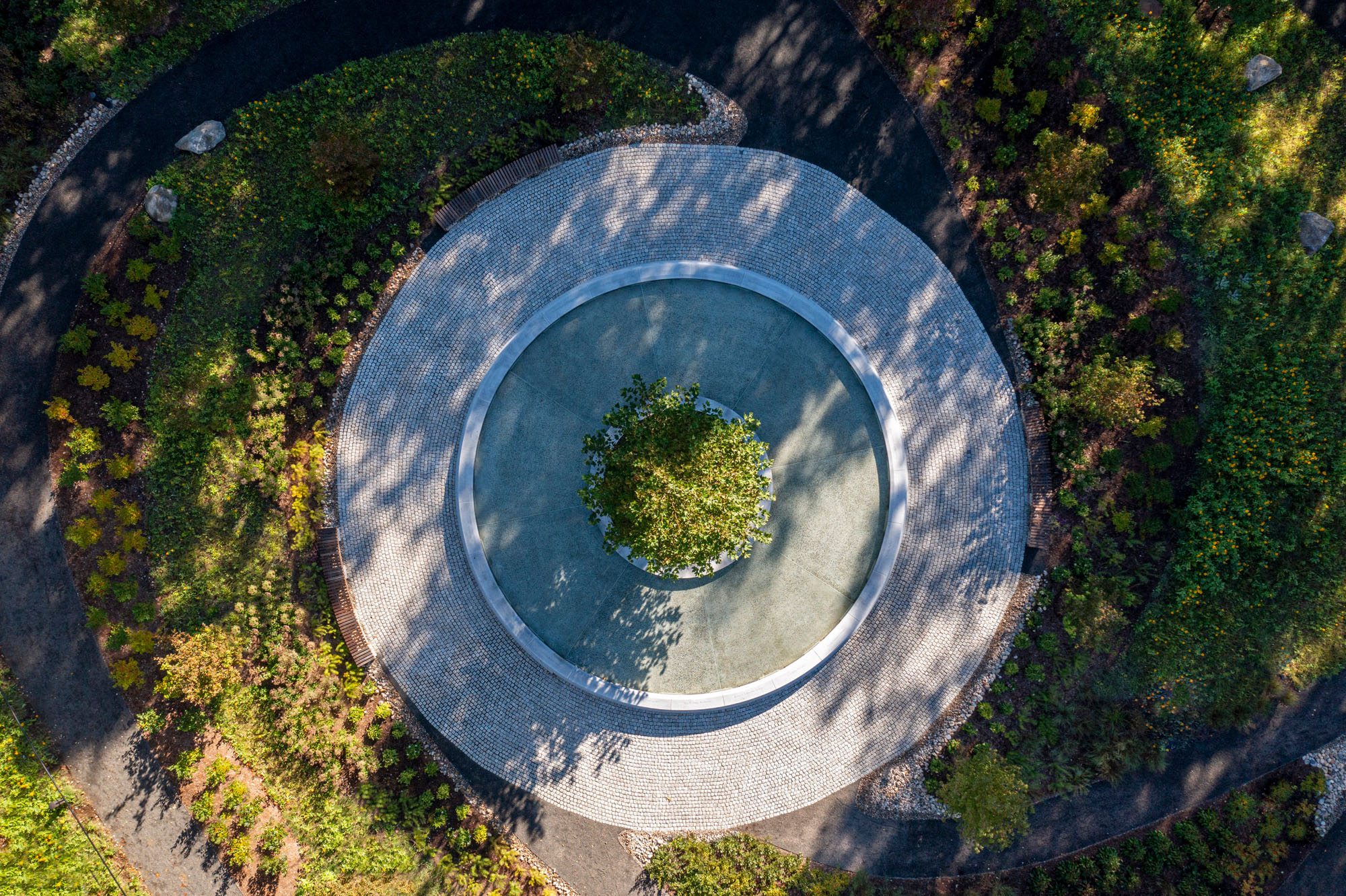 aerial detail of circular memorial and pathway