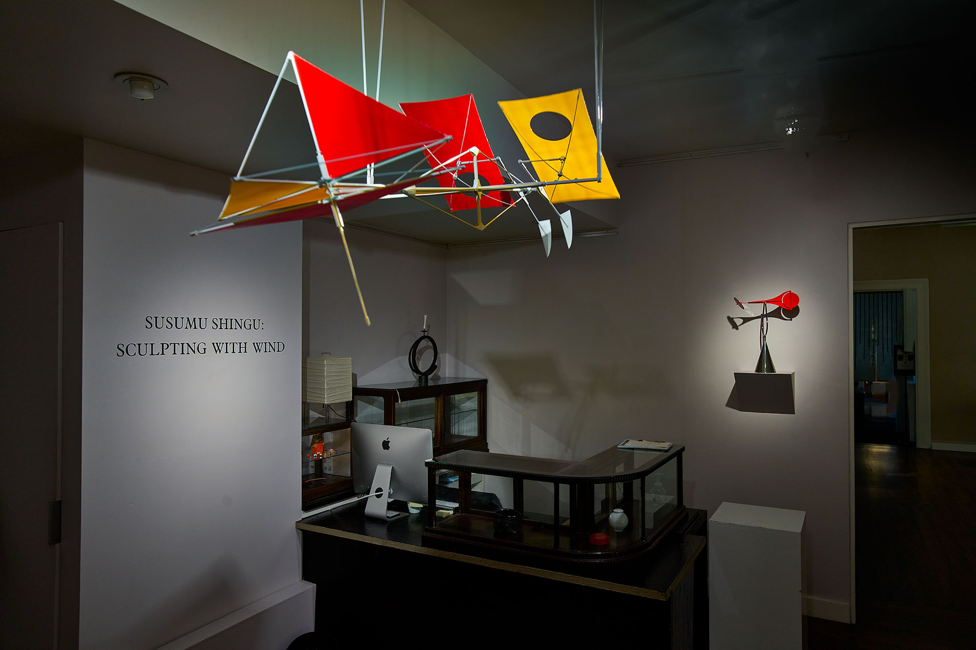 sculptures by Susumu Shingu hang from the ceiling at Ippodo in New York