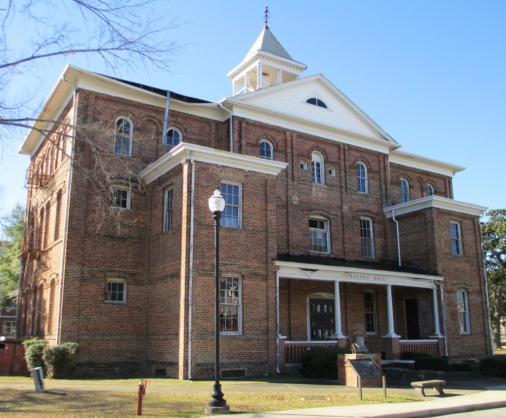 a photograph of Thrasher Hall, a brick building on the tuskegee campus